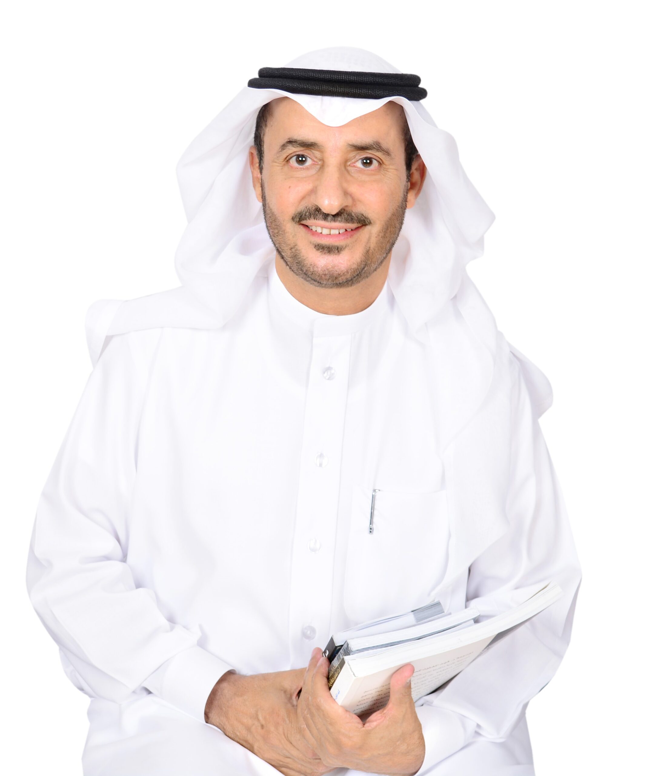 Life coach at Aldabiby academy wearing formal Saudi thobe and igal